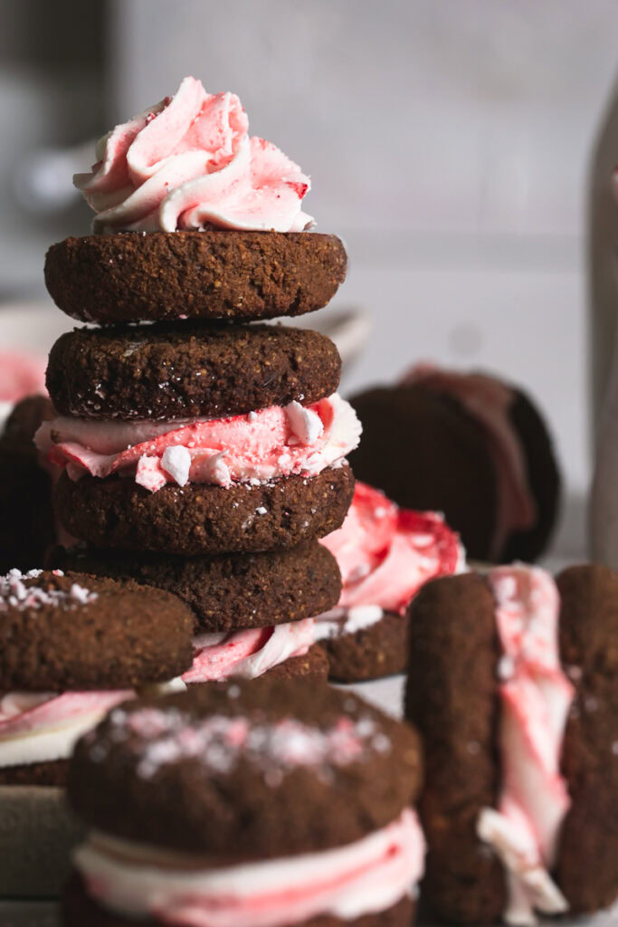 a close up of the stack of peppermint cream sandwich cookies