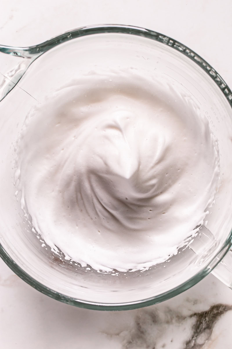 a bowl of whipped aquafaba to resemble whipped egg whites
