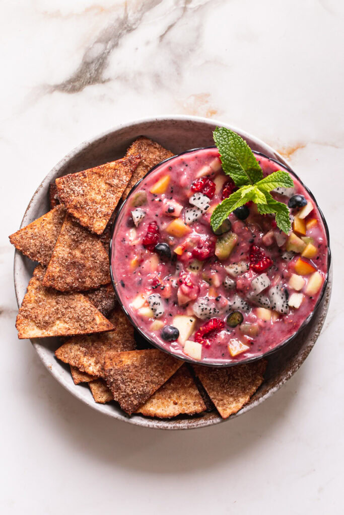 Air Fryer Churro Chips and Fruit Salsa in a bowl garnished with fresh mint